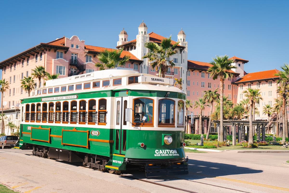 A trolley proceeds through the streets of the Strand historic district in Galveston, Texas. (Visit Galveston)
