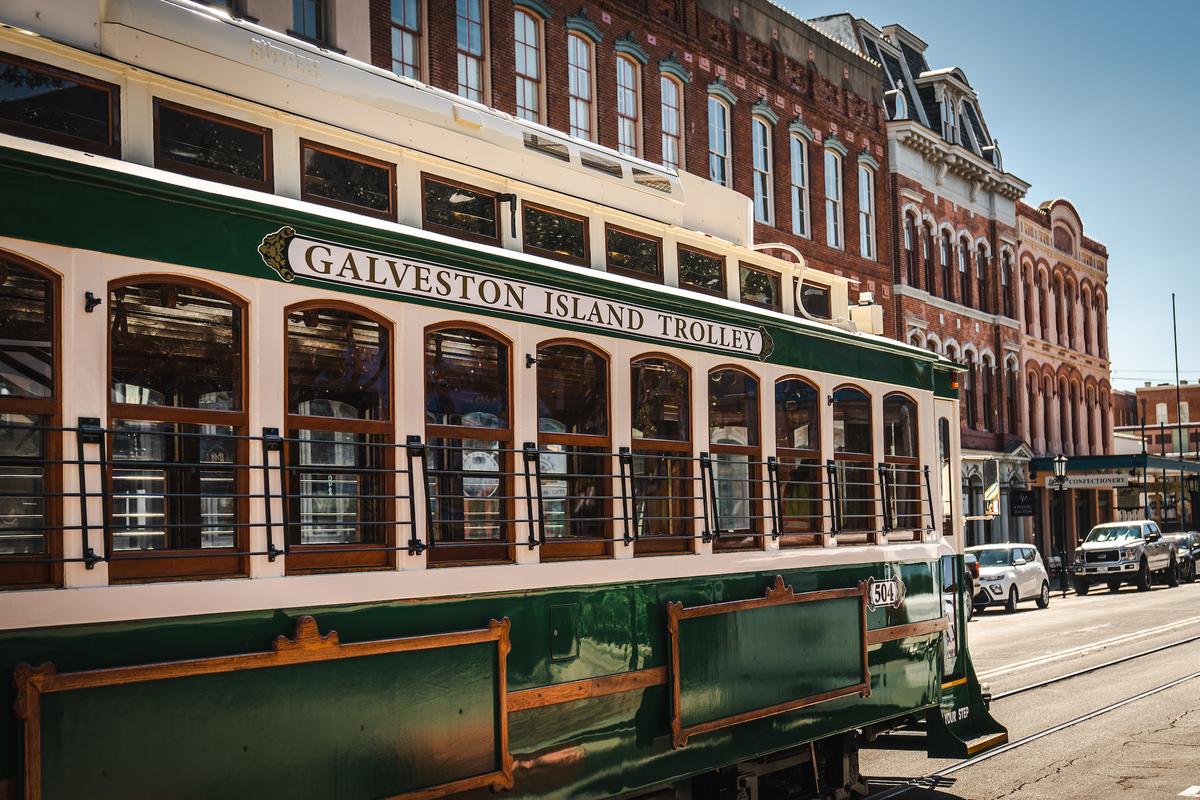 A trolley proceeds through the streets of the Strand historic district in Galveston, Texas. (Visit Galveston)