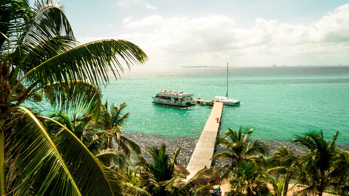 Isla Mujeres, eight miles off the coast, feels completely different from Cancun, Mexico. (Gerson Repreza/Unsplash)