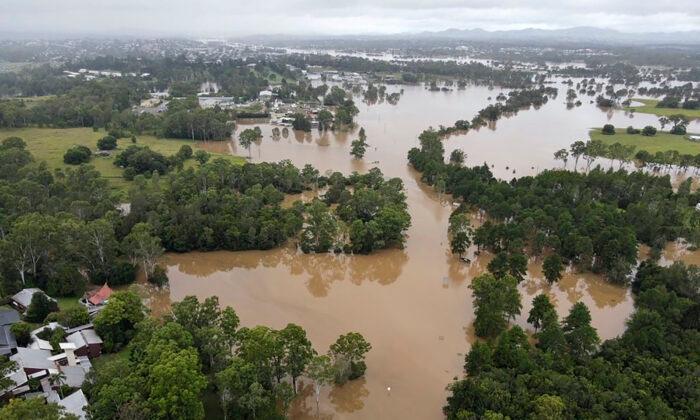 Australian Man and Pet Dog Swept to Deaths as Flooding Continues