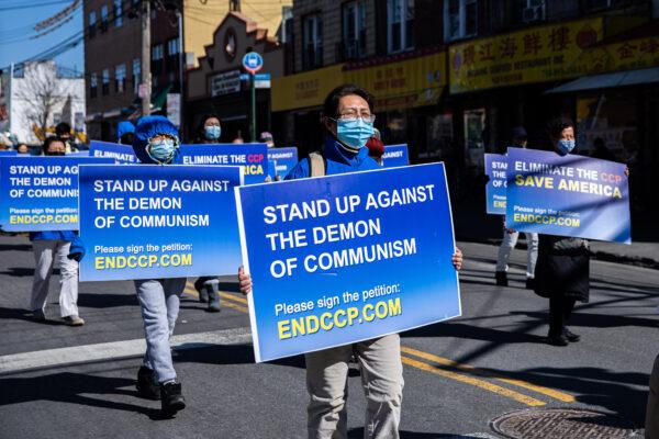 Falun Gong practitioners gather to support the withdrawal of 390 million people from the Chinese Communist Party and its associate groups, in Brooklyn, New York, on Feb. 27, 2022. (Chung I Ho/The Epoch Times)