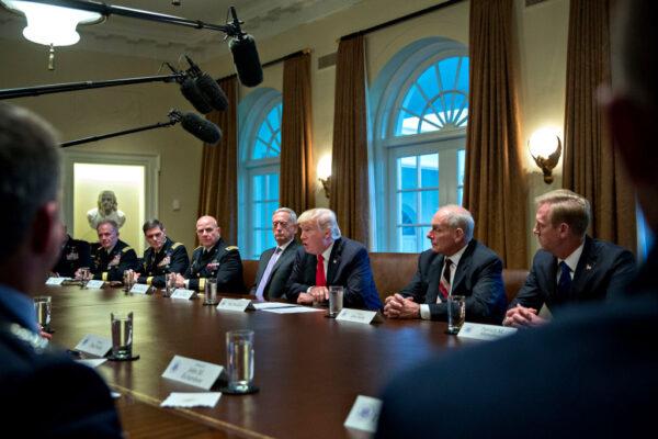 President Donald Trump (center), national security adviser H.R. McMaster (3rd L), White House chief of staff John Kelly (4th L), and Defense Secretary Jim Mattis (2nd R) attend a briefing with senior military leaders in the Cabinet Room of the White House in Washington on Oct. 5, 2017. Mattis said this week that the U.S. and allies are "holding the line" against the Taliban in Afghanistan as forecasts of a significant offensive by the militants remain unfulfilled. (Andrew Harrer-Pool/Getty Images)