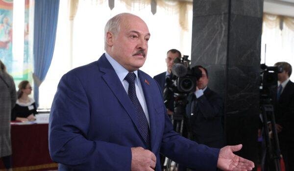 Belarus' President Alexander Lukashenko speaks to the media after casting his ballot in the referendum on the constitutional amendments at a polling station in Minsk on Feb. 27, 2022. (Sergei Sheleg/BELTA/AFP via Getty Images)