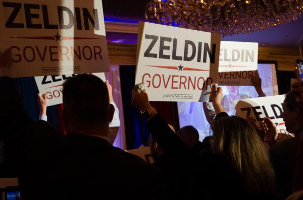 Delegates at the New York state Republican convention in Garden City, New York, on March 1, 2022, show their support for Lee Zeldin, the party’s nominee for governor. (Dave Paone/The Epoch Times)