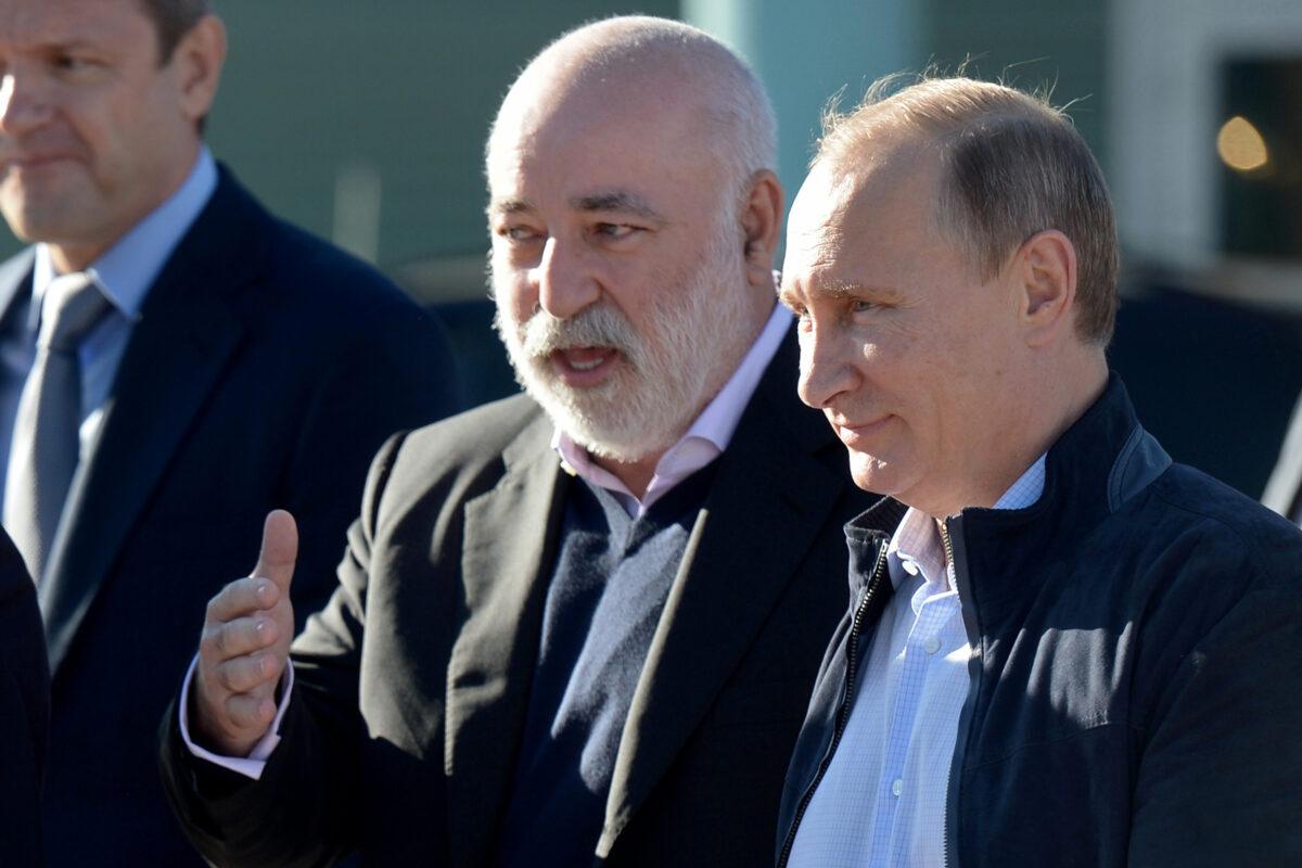 Russian President Vladimir Putin (R) speaks with Skolkovo Foundation President Viktor Vekselberg during his visit to the National Children's Sports and Health Centre in Sochi on October 11, 2014. (Alexey Nikolsky/POOL/AFP via Getty Images)