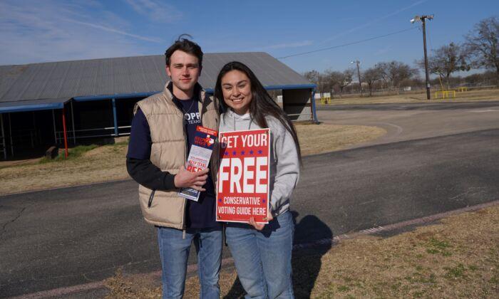 Senior Stephen Moitz, 22, is the president of the Young Conservatives of Texas club at the University of North Texas. He is pictured with Bryanna Vasquez on March 1, 2022, at the Republican primary poll in Denton, Texas. (Patrick Butler/The Epoch Times)