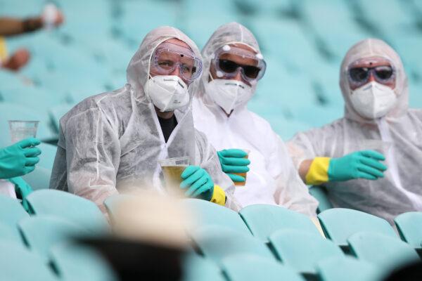 Supporters wearing protective masks during the Third Test match in the series between Australia and India in Sydney, Australia on Jan. 07, 2021. (Mark Kolbe/Getty Images)