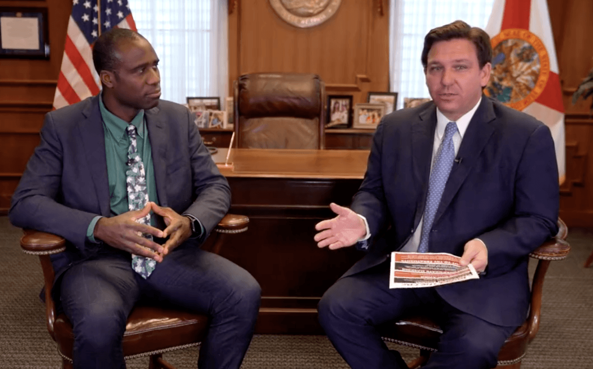 Florida Surgeon General Joseph Ladapo (L) and Florida Gov. Ron DeSantis at the governor's office in Tallahassee on Feb. 24, 2022, in a still from video. (Florida Governor's Office/Screenshot via The Epoch Times)