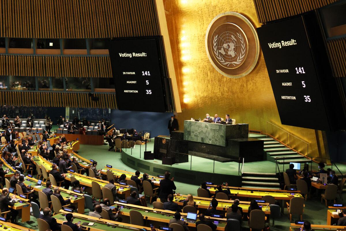 The results of a General Assembly vote on a resolution are shown on a screen during a special session of the General Assembly at the United Nations headquarters in New York on March 2, 2022. (Michael M. Santiago/Getty Images)