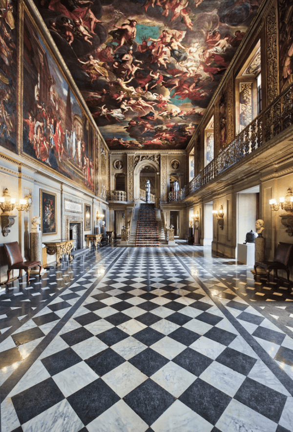 The Painted Hall, regarded as the heart of Chatsworth, presents a ceiling painting by Louis Laguerre telling the story of Julius Caesar. Since 1890, the hall has been the setting for an annual Christmas party for the children of the estate. (Chatsworth House Trust)