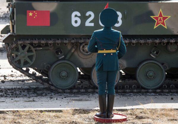  A Russian honor guard attends a parade near Russia's border with China, on Sept. 13, 2018. (Mladen Antonov/AFP via Getty Images)