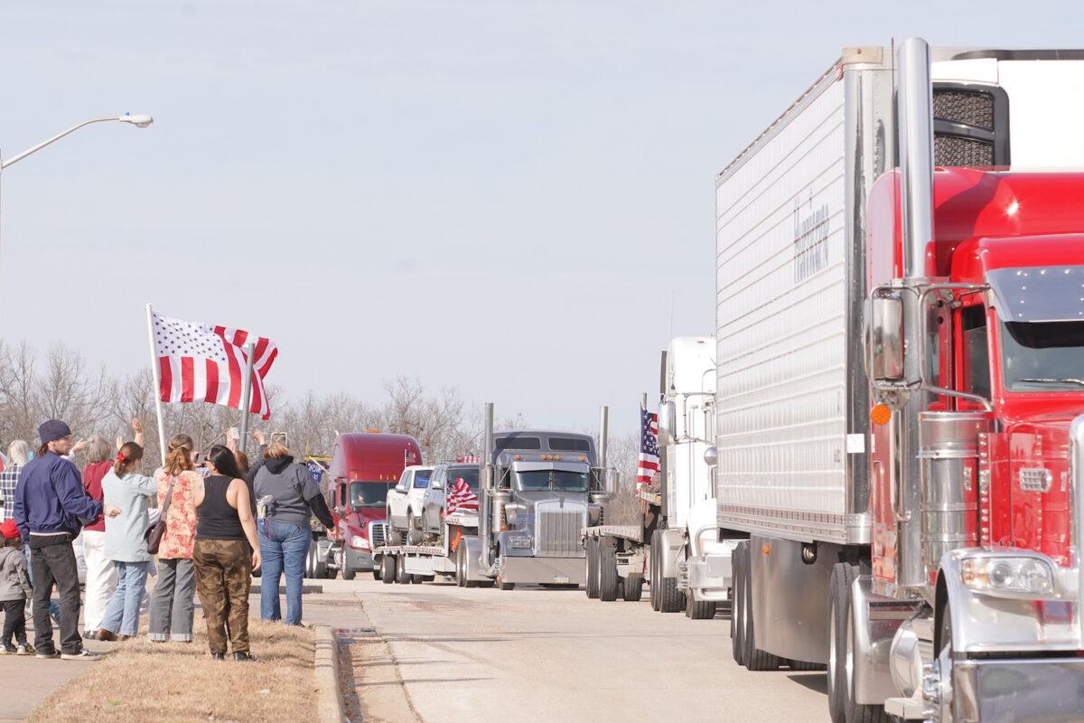 Trucks of the People's Convoy entering a highway in Missouri, on Feb. 28, 2022. (Enrico Trigoso/The Epoch Times)