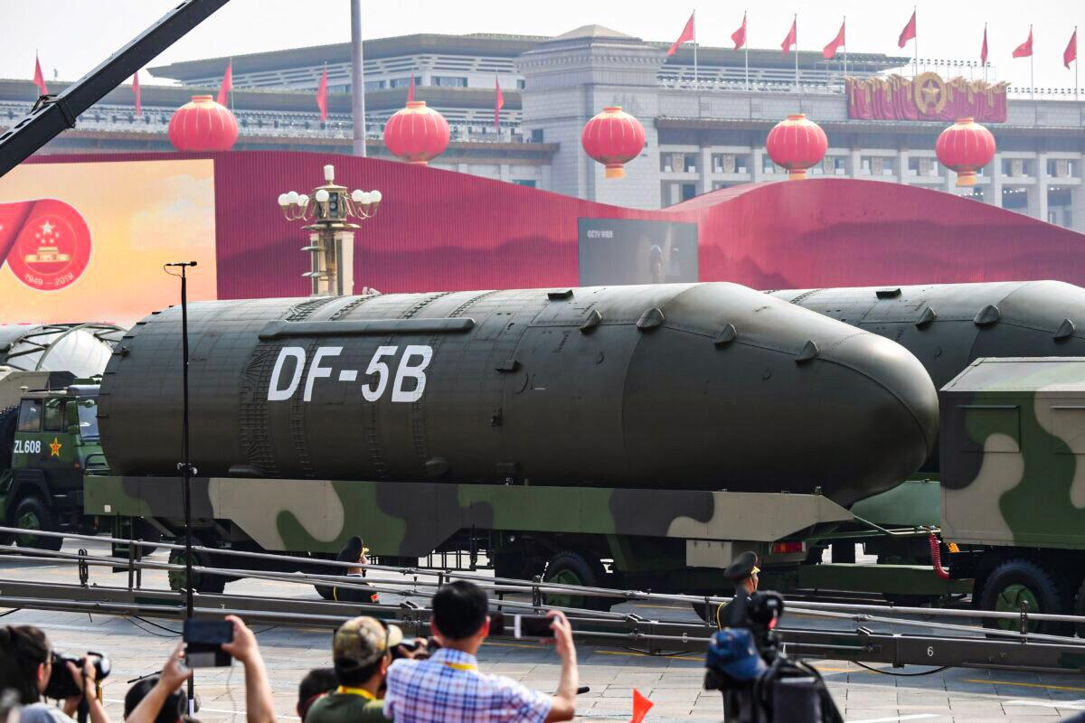 Military vehicles carrying DF-5B intercontinental ballistic missiles participate in a military parade at Tiananmen Square in Beijing, China, on Oct. 1, 2019. (Greg Baker/AFP via Getty Images)