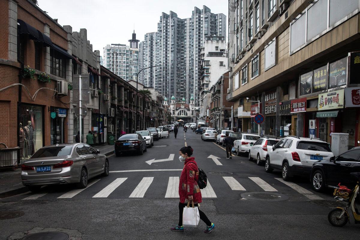 A women walking in the street in Wuhan, Hubei Province, China, on April 11, 2020. (Getty Images)