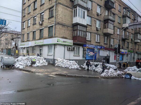 Sandbags piled in the streets of Kyiv, Ukraine provide places to shelter from Russian missiles and gunfire that cut through the city in February 2022. (Courtesy of James Judge, Project Dynamo)