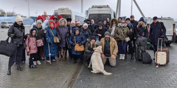  A group of Americans and citizens from other countries pose for one last photo before boarding a bus on the first leg of their escape from Ukraine after the Russian invasion began on Feb. 16, 2022. (Courtesy of James Judge, Project Dynamo)