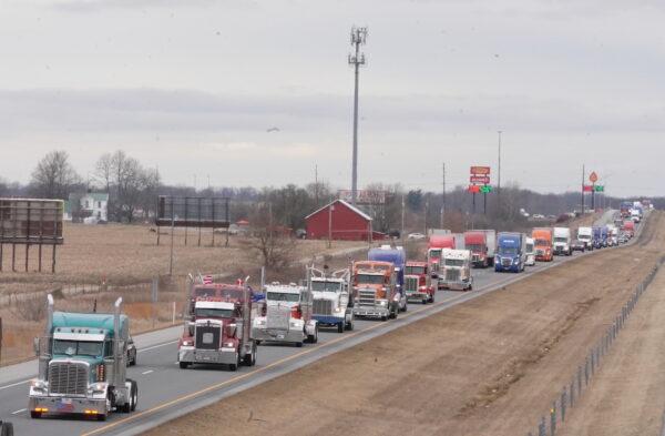 Trucks of The People's Convoy traveling from Indiana to Lore City, Ohio, on March 3, 2022. (Enrico Trigoso/The Epoch Times)