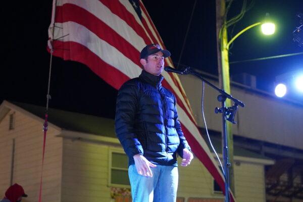 Joshua Yoder, co-founder of the U.S. Freedom Flyers, speaks to a rally in Hagerstown, Md., on March 4, 2022. (Enrico Trigoso/The Epoch Times)