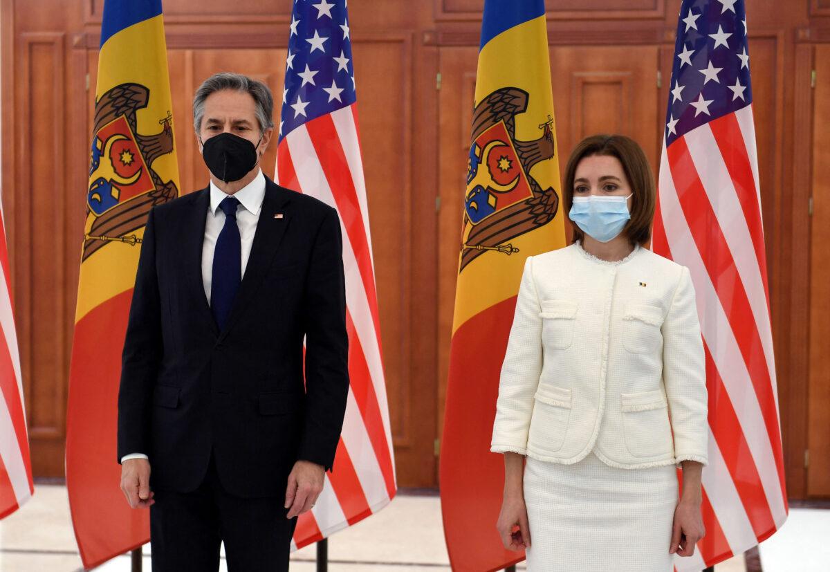 US Secretary of State Antony Blinken (L) poses with Moldovan President Maia Sandu at The Presidential Palace in Chisinau, on March 6, 2022. (Oliver Douliery/Pool/AFP via Getty Images)