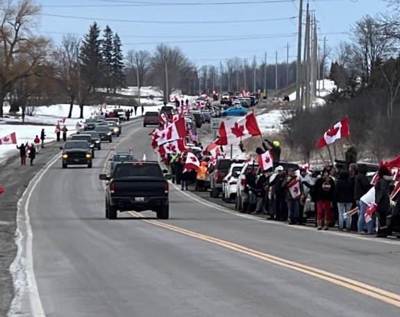 Demonstrators take part in the Freedom Chain in Peterborough, Ont., on March 5, 2022. (Caleb Shipman)