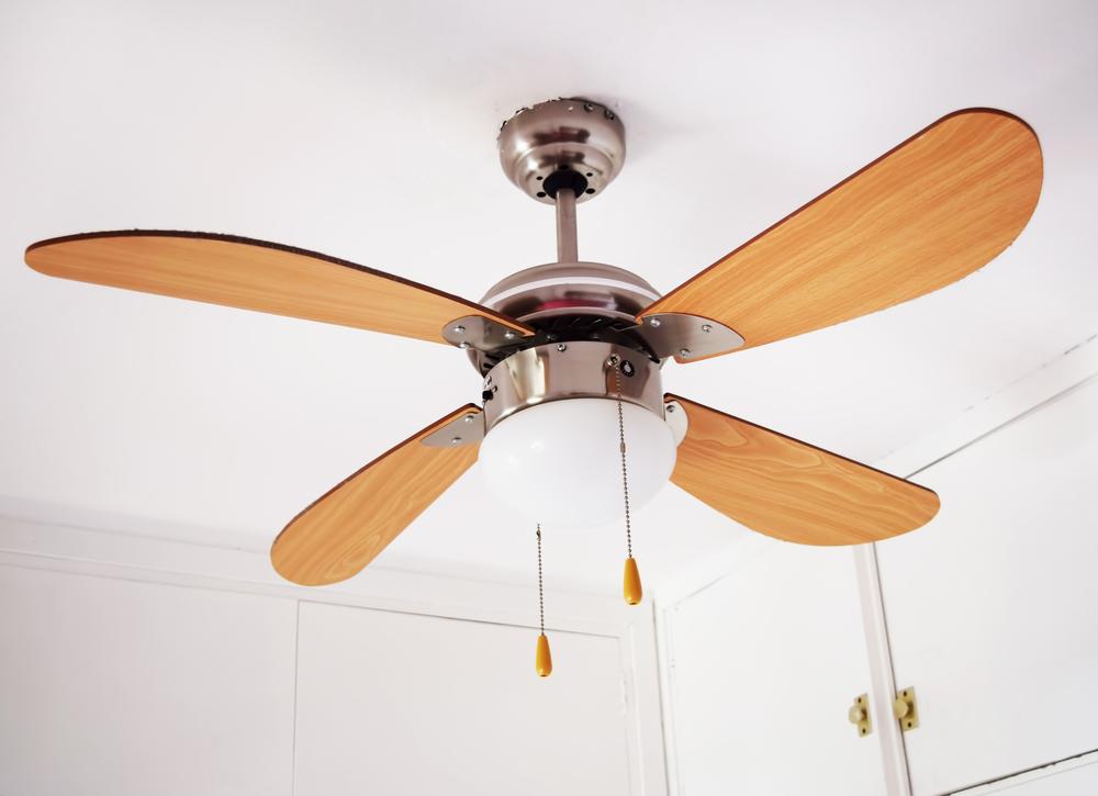 Ceiling fans are notorious dust-collectors, and sitting stationary for a few months really gives dirt a chance to settle.(OllyPlu/Shutterstock)