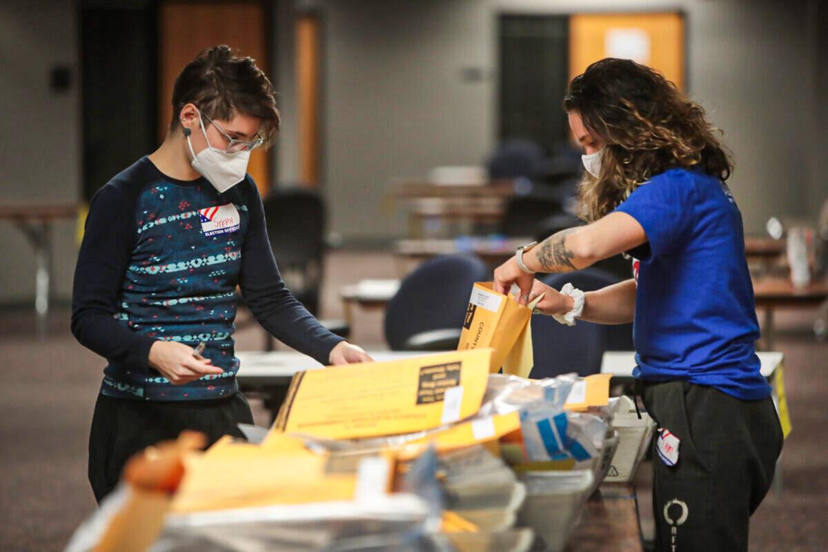 Election officials count absentee ballots in Milwaukee on Nov. 4, 2020. (Scott Olson/Getty Images)