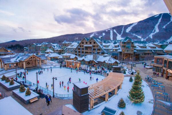 A view of the skating rink, Stowe Mountain Resort village, and Mount Mansfield. (Courtesy of Stowe Mountain Resort/ Vail Resorts)