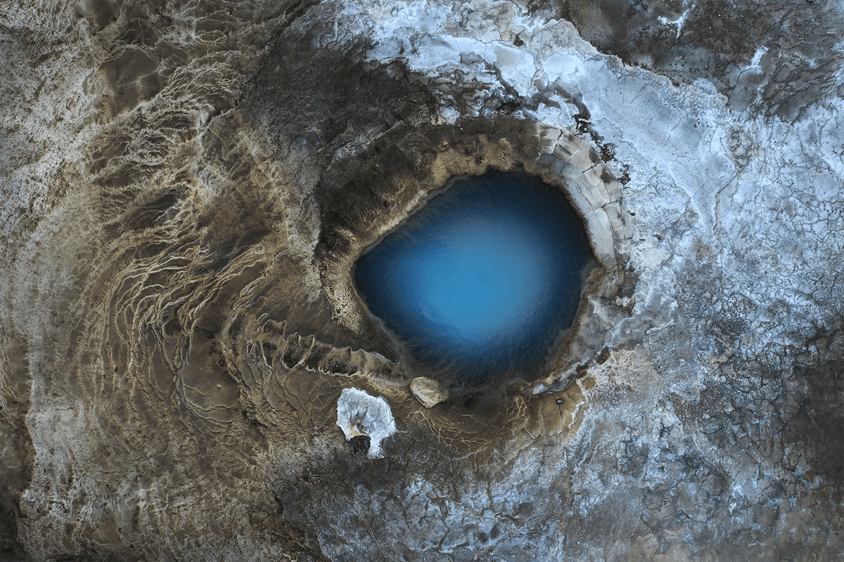 "Earth’s Eye" by Mathis Vandermeeren, Belgium; "This picture was taken with my drone in a geothermal area called Hverravellir in the center of Iceland, in August 2021. It shows a natural hot spring that has a wonderful blue color, especially when seen from above." (© Mathis Vandermeeren, Belgium, Winner, National Awards, Landscape, 2022 Sony World Photography Awards)
