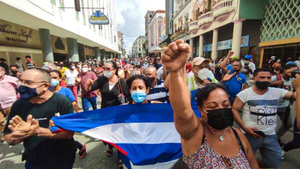 People take part in a demonstration against the government of Cuban President Miguel Diaz-Canel in Havana, on July 11, 2021. (Yamil Lage/AFP via Getty Images)
