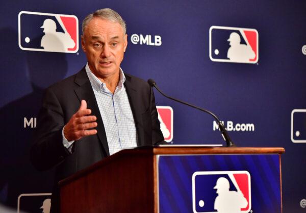 Major League Baseball Commissioner Rob Manfred answers questions during an MLB owner's meeting at the Waldorf Astoria, in Orlando, Fla., on Feb. 10, 2022. (Julio Aguilar/Getty Images)