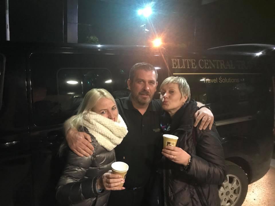 Murphy with two Estonian girls he helped in 2018 by driving from Aberdeen to Birmingham for their flight home. (Courtesy of <a href="https://www.elitecentraltravel.co.uk/">John Murphy</a>)