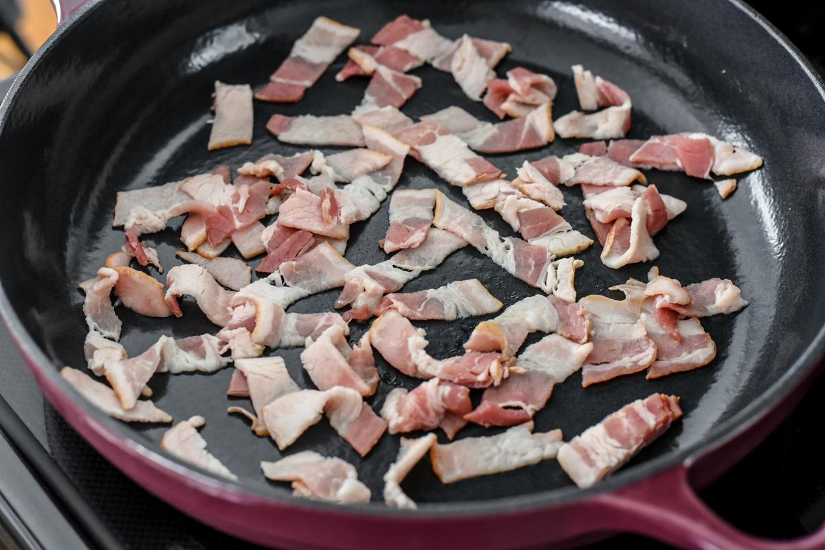 Fry the bacon matchsticks until crisp. (Audrey Le Goff)