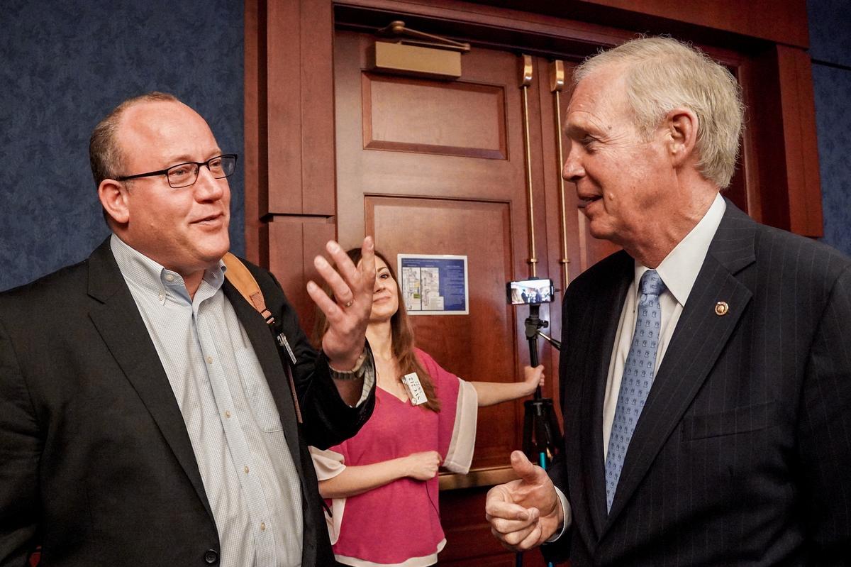 Dr. Pierre Kory (L) and Sen. Ron Johnson (R-Wis.) at the Senate Visitor Center in U.S. Capitol on Mar. 8, 2022. (Terri Wu/The Epoch Times)