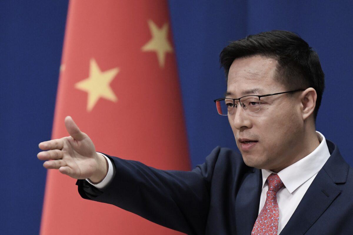 Chinese Foreign Ministry spokesman Zhao Lijian takes a question at the daily media briefing in Beijing on April 8, 2020. (Greg Baker/AFP via Getty Images)