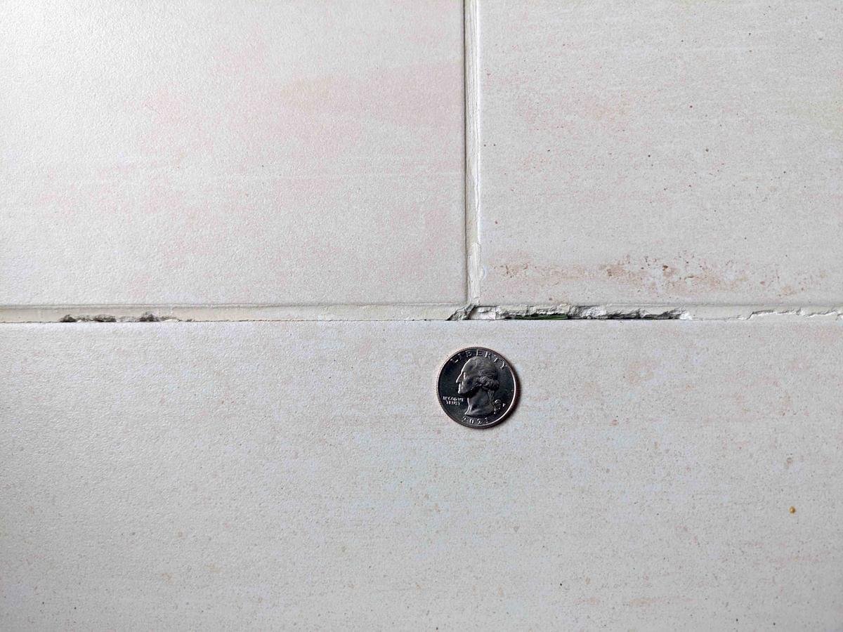 This grout is less than two years old. It started to degrade less than six months after being installed. (Tim Carter/TNS)