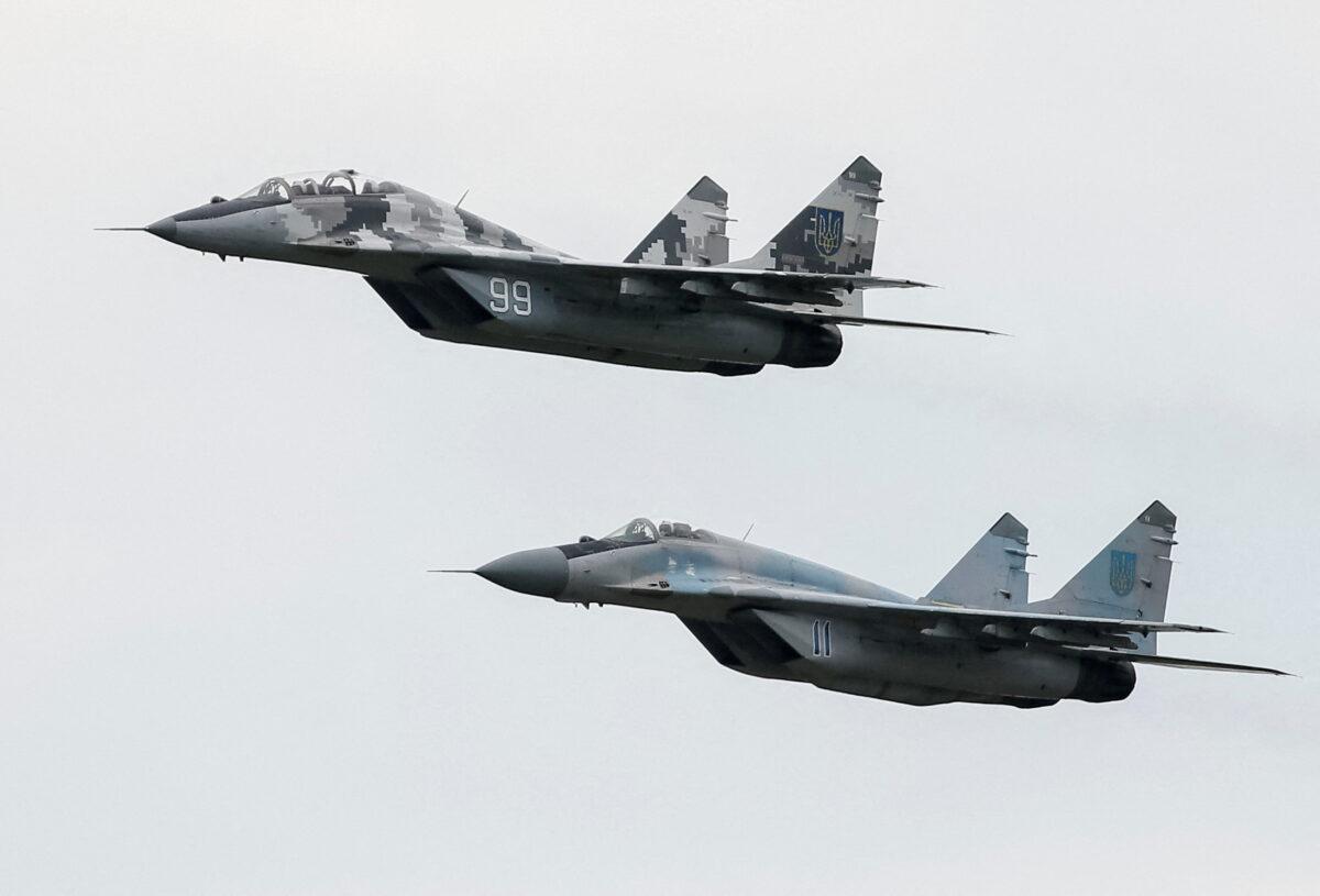 MIG-29 fighter aircraft fly at a military airbase in Vasylkiv, Ukraine, in a file image. (Gleb Garanich/Reuters)
