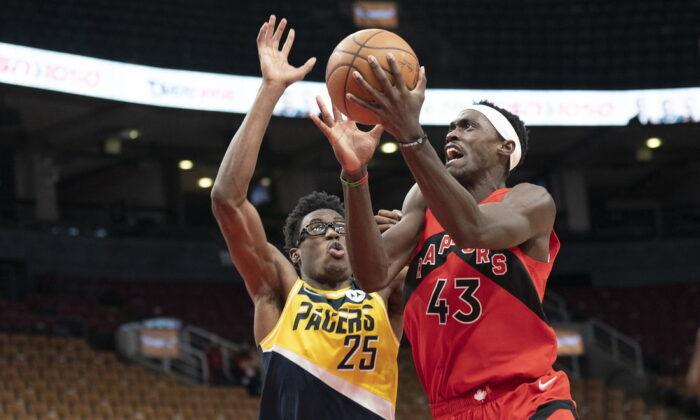 NBA Roundup: Host Raptors Rout Pacers in Fire-Delayed Game