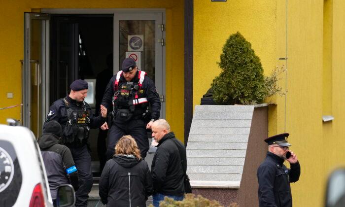 Student Held Over Teacher's Machete Killing at Prague School
