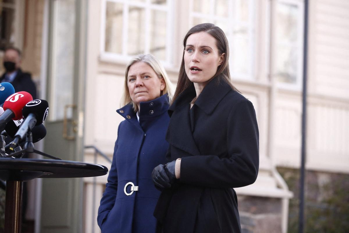 Finland's Prime Minister Sanna Marin (front) and her Swedish counterpart Magdalena Andersson speak to the media outside the prime minister's official residence, Kesaranta, in Helsinki, Finland, on March 5, 2022. (Roni Rekomaa/Lehtikuva via Reuters)