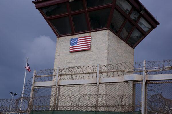 The U.S. flag decorates the side of a guard tower inside of Joint Task Force Guantanamo Camp VI at the U.S. Naval Base in Guantanamo Bay, Cuba, in March 2016. (Lucas Jackson/Reuters)
