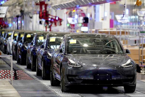 Tesla's China-made Model 3 vehicles are seen during a delivery event at its factory in Shanghai on Jan. 7, 2020. (Aly Song/Reuters)