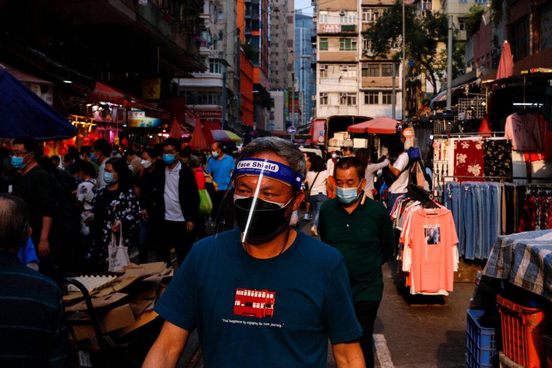 Hong Kong Plans to Review COVID-19 Restrictions on Monday as Cases Ease