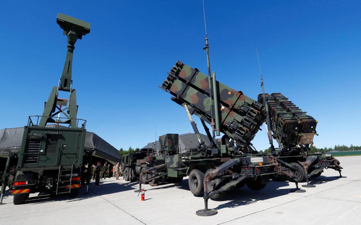 U.S. long-range air defense systems Patriot (R) and British radar Giraffe AMB are displayed during Toburq Legacy 2017 air defense exercise in the military airfield near Siauliai, Lithuania, on July 20, 2017. (Ints Kalnins/Reuters)