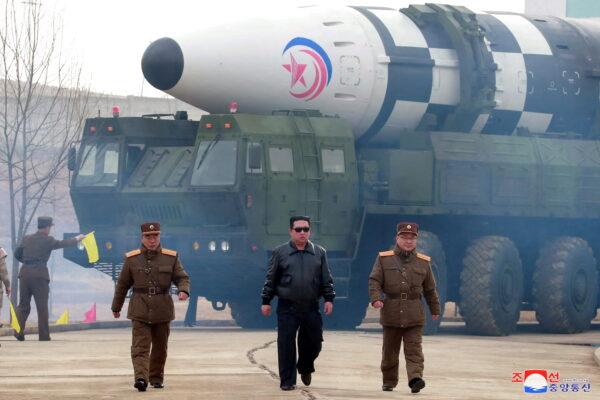North Korean leader Kim Jong Un walks away from what state media report is a "new type" of intercontinental ballistic missile in this undated photo released on March 24, 2022, by North Korea's Korean Central News Agency (KCNA). (KCNA via Reuters)