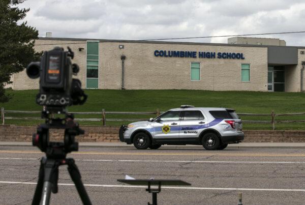 Police patrol outside Columbine High School in Littleton, Colo., on April 17, 2019. (Chet Strange/AFP via Getty Images)