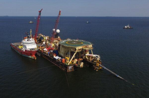 In this aerial view, the Castoro 10 pipelay vessel lays concrete-coated pipe for the Nord Stream 2 gas pipeline onto the seabed of the Baltic Sea near Lubmin, Germany on Aug. 16, 2018. (Sean Gallup/Getty Images)