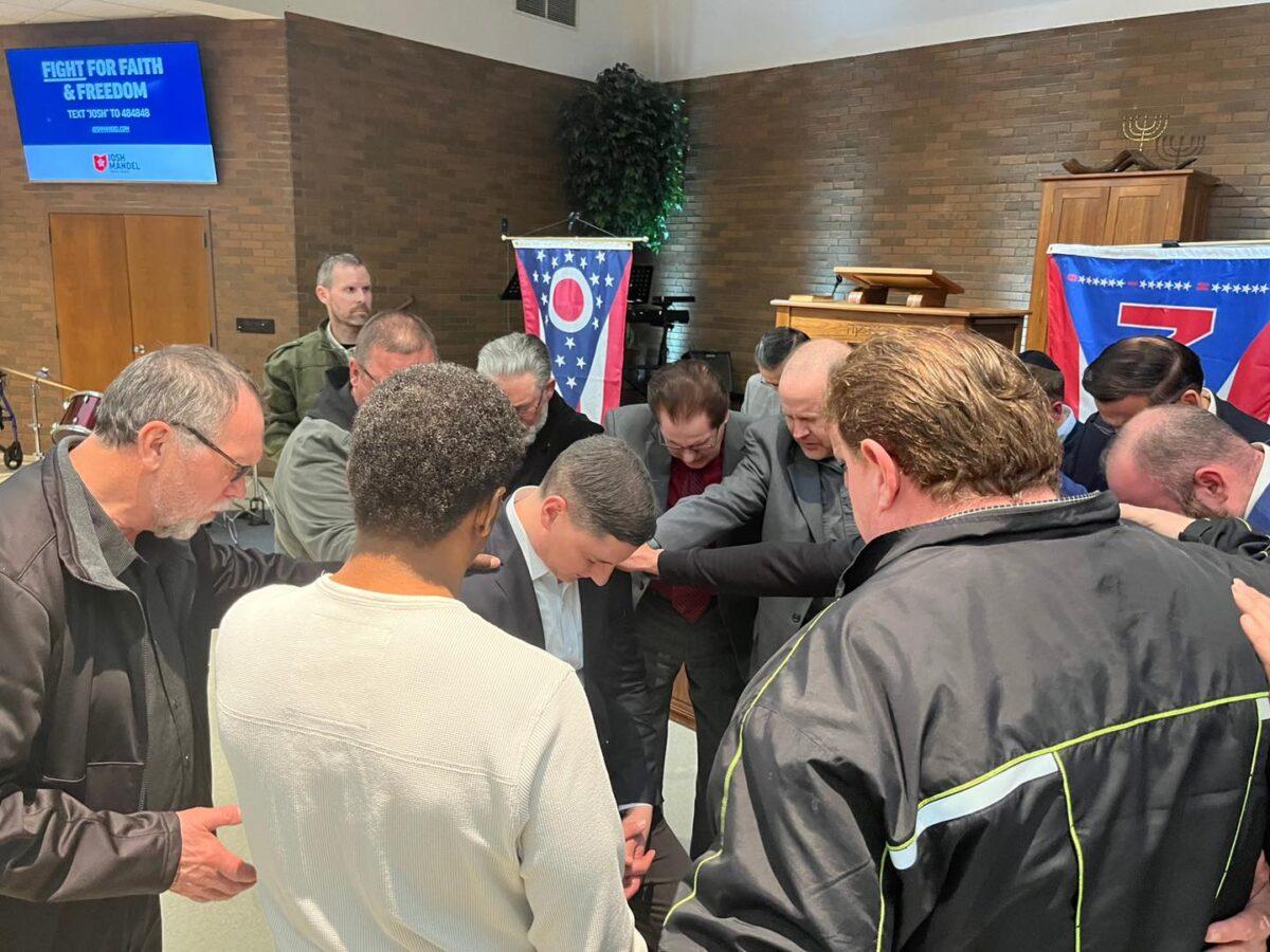  A group of pastors prays with Ohio Republican U.S. Senate candidate Josh Mandel at a "Faith and Freedom" rally in Mansfield, Ohio in early March. (Courtesy of Josh Mandel Twitter)
