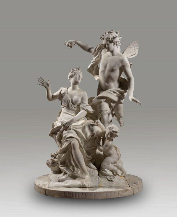 "Zephyr, Flora, and Love," 1769, by Philippe Bertrand, René Frémin, and Jacques Bousseau. Marble; 83 7/8 inches by 59 inches. Palace of Versailles. (Christophe Fouin/Palace of Versailles)