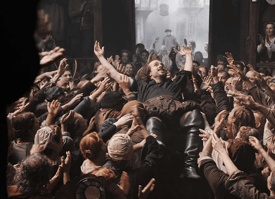 Will Shakespeare (Rafe Spall) crowd-surfing in the Globe Theatre, in "Anonymous." It's doubtful that crowd-surfing in mosh pits was a thing in the late 1500s, but who knows? (Reiner Bajo/Columbia TriStar Marketing Group, Inc.)