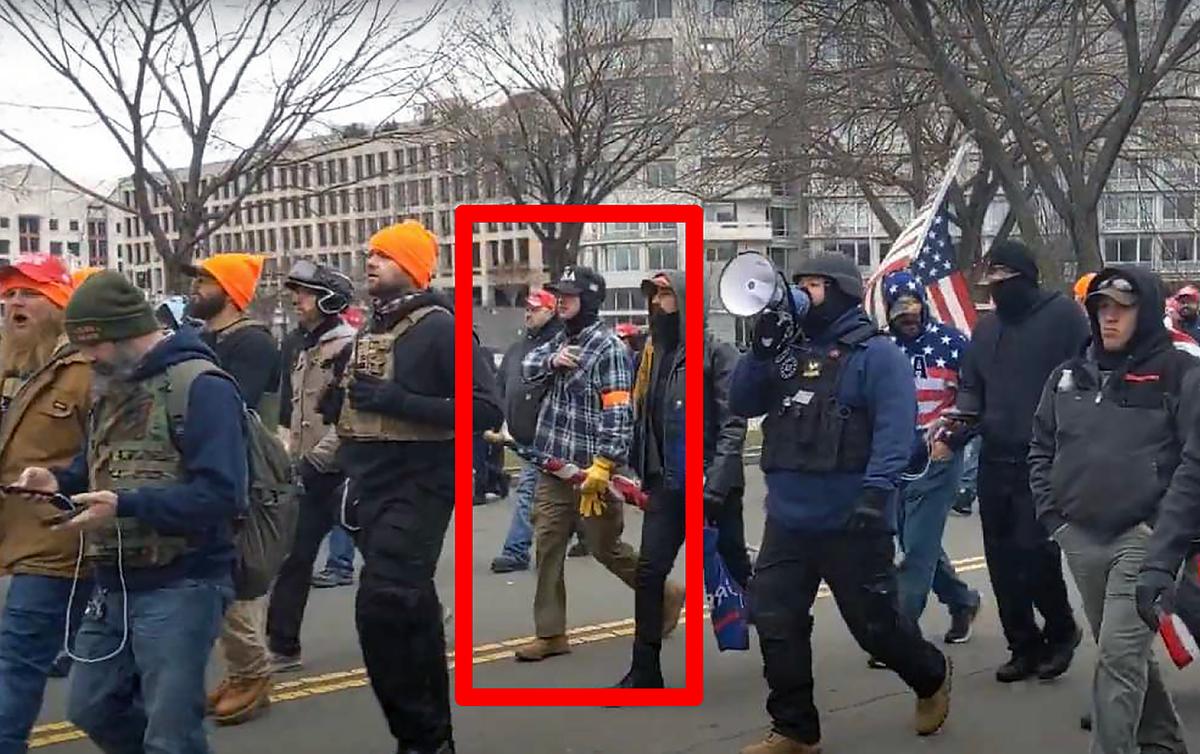 Micajah J. Jackson walks from the Ellipse to the U.S. Capitol with some of the Proud Boys on Jan. 6, 2021. (U.S. Department of Justice / Screenshot via The Epoch Times)